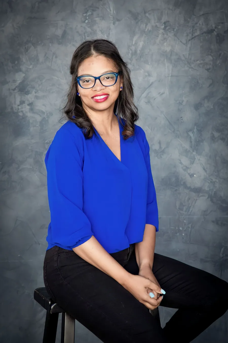 Mrs. Tenisha Collins in a royal blue blouse